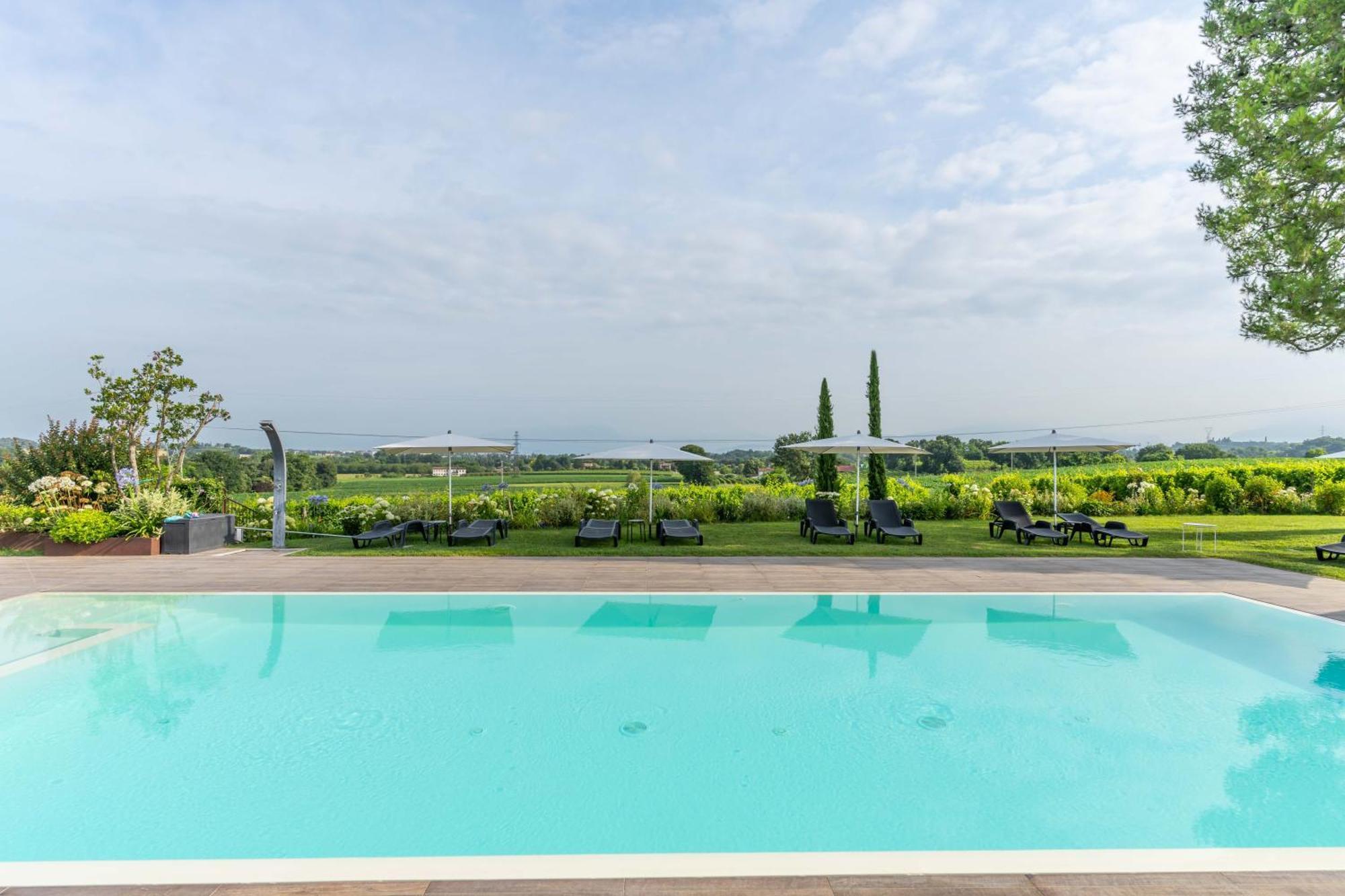 Agriturismo Colle Dei Pivi ポンティ・スル・ミンチョ エクステリア 写真